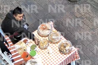 Graban un descarado robo en un puesto de comida callejero (VIDEO)