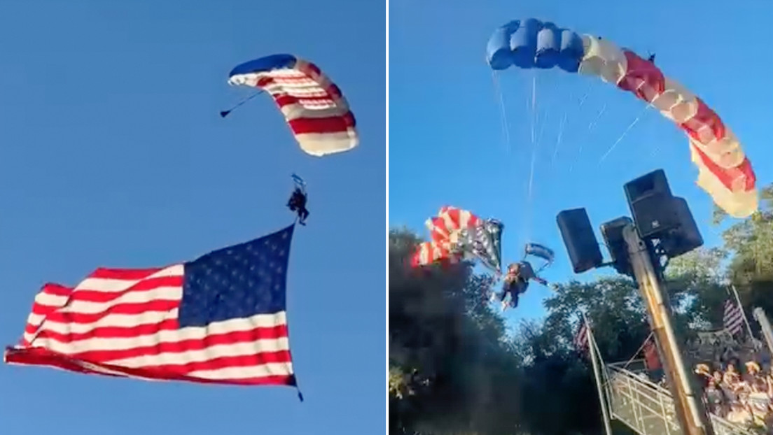 VIDEO: Accidentado aterrizaje de un paracaidista con una enorme bandera de EE.UU.